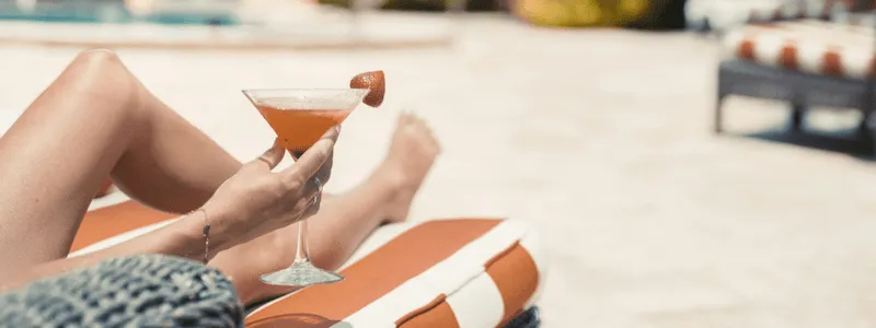 drink next to a pool