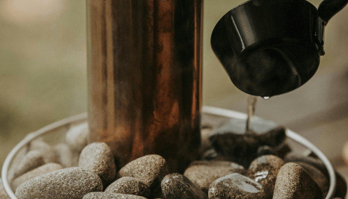 pouring hot water on stones