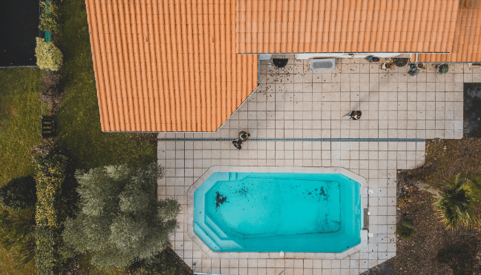 cleaning a swimming pool