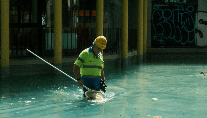 cleaning a swimming pool